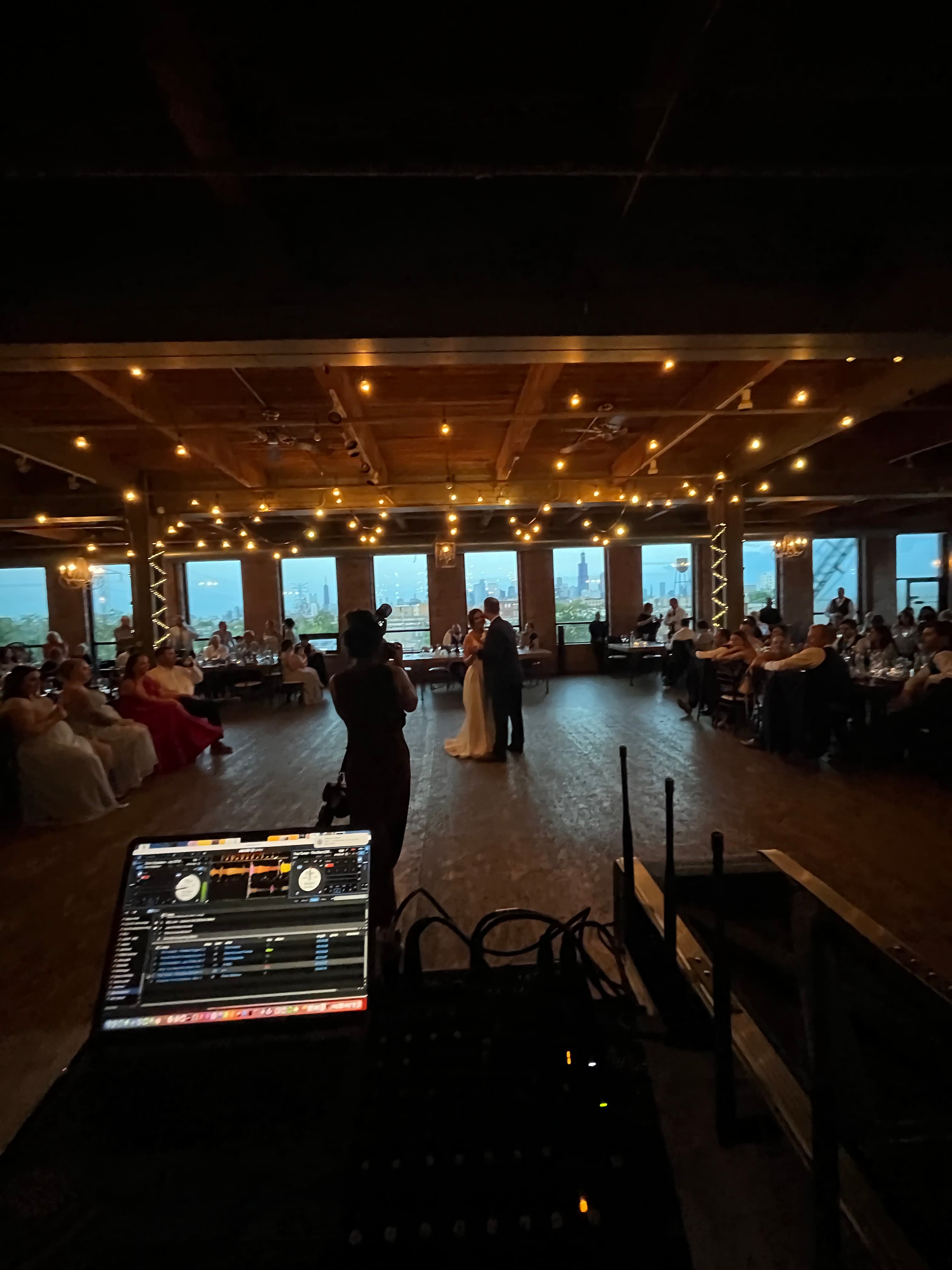 Wedding reception with bride and groom on the dance floor